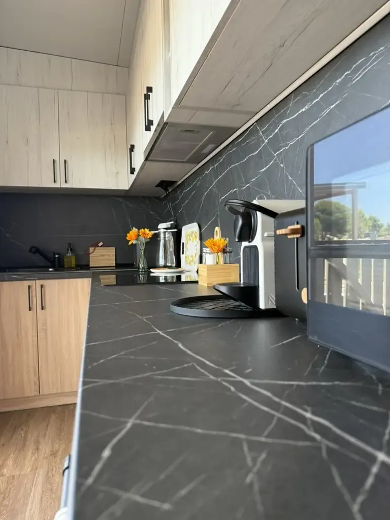 Kitchen counter with microwave and coffee machine