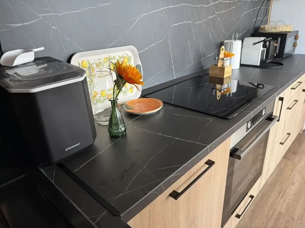 Kitchen hob, oven and ice maker