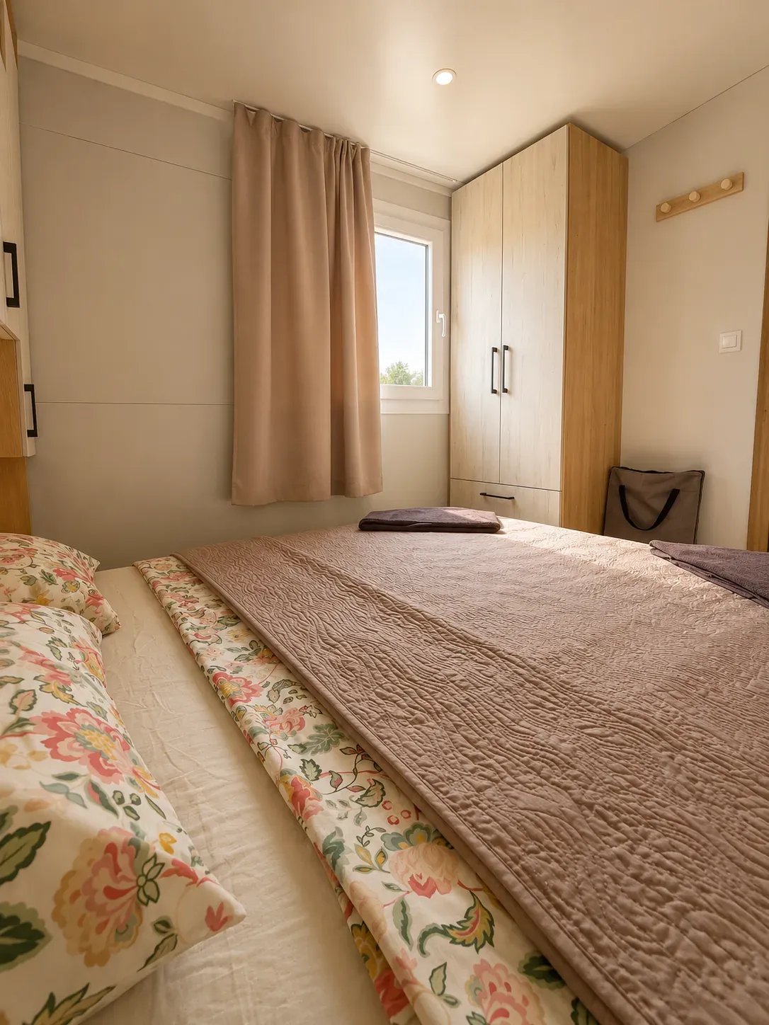 Double bedroom with wardrobe and daylight window